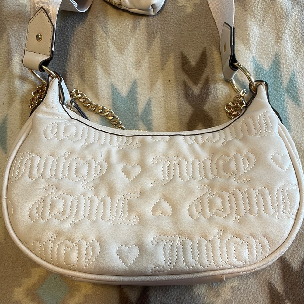 Juicy couture purse with wallet .